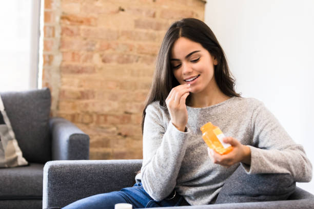 istock Woman taking prescription medication 1227422709
