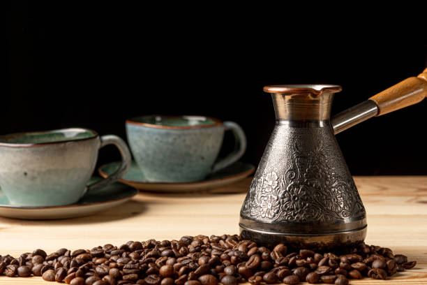 istock Copper cezve with coffee on the table 1227426687