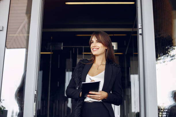 istock Elegant businesswoman working in a office 1227432377