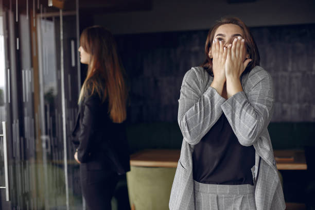 istock Two businesswomen working in a cafe 1227433098