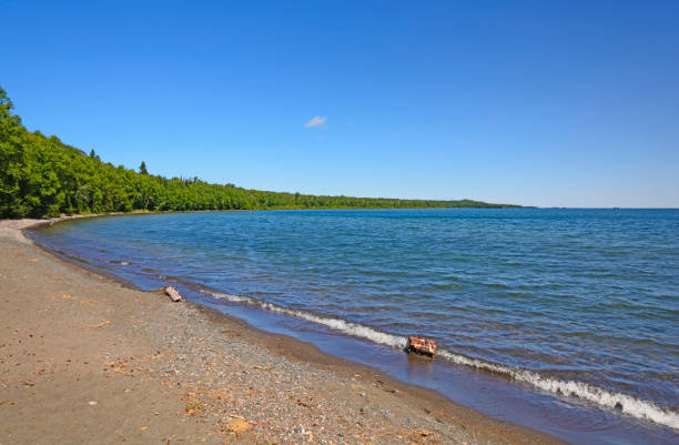 istock Calm Waters on a Remote Lake Superior Shore 1227433863