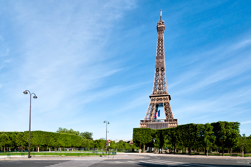 Tour Eiffel and Champ de Mars are empty during pandemic Covid 19 in Europe. There are no people or no tourists few days after the Covid 19 virus lockdown in Paris. France - May 12, 2020