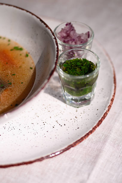 istock A bowl of soup stands on a cloth tablecloth 1227439388