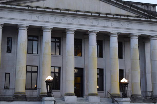 istock Facade Of Classical Sandstone Building With Columns And Windows During Sunrise 1227440227