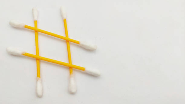 istock Ear swabs or cotton ear sticks on the light background. 1227442077