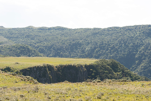 Image of the landscape with a plateau and the canyon in the surroundings of the Serra do Corvo Branco at the Serra Catarinense in Urubici, Santa Catarina state - Brazil
