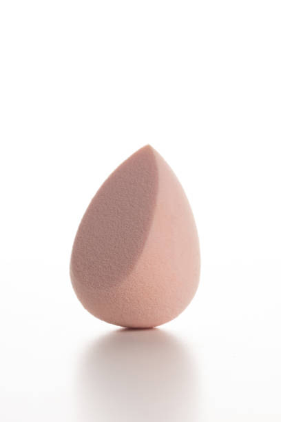 istock pink beauty blender for makeup on isolated background 1227449474