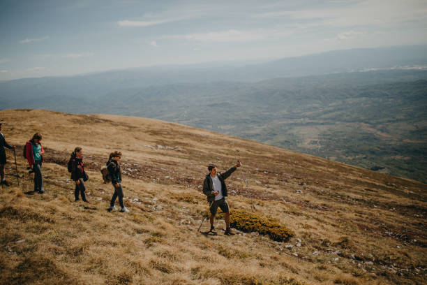 istock Friends walking over the mauntain 1227449591