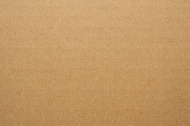 istock Brown eco recycled cardboard paper sheet texture background 1227451808