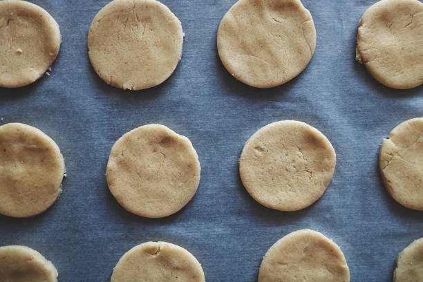 istock Round pieces of shortbread dough for making cookies or gingerbread 1227452044
