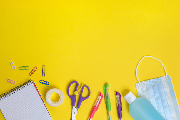 istock protective mask, disinfectant and school supplies 1227452402