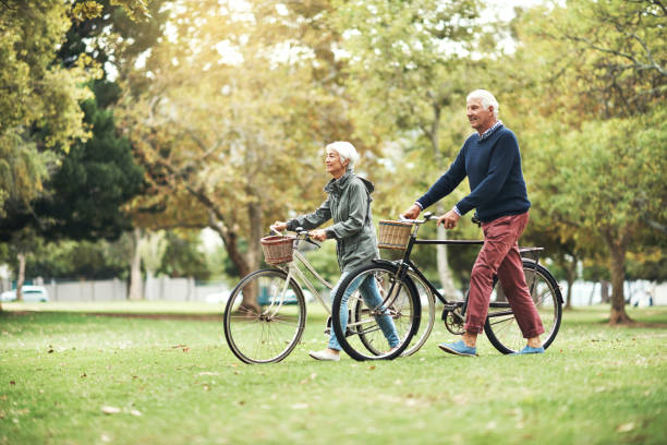 istock Cycling through the park has become a tradition 1227454814