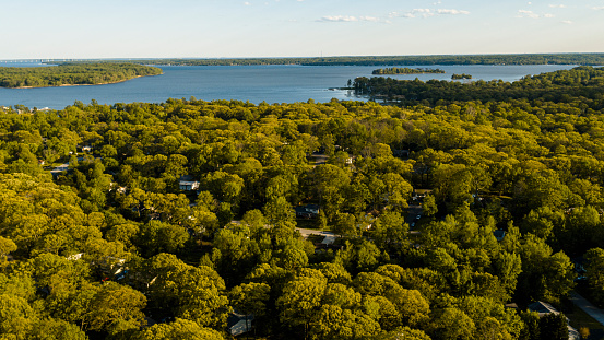 Aerial scenic view of the Chesapeake Bay in Pasadena, Maryland, on a warm evening in the springtime.