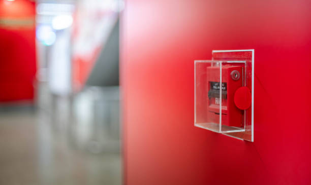 istock The red fire alarm switch on the red wall at the Bangkok subway. 1227457193