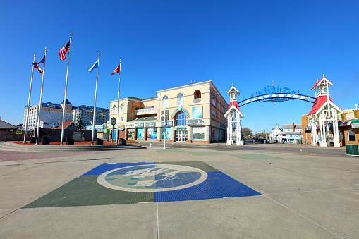 Ocean City, Maryland, USA - February 22, 2020: Morning view of shops and hotels along a 3 mile wooden boardwalk on the atlantic ocean