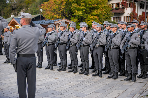 German soldiers are holding a memorial ceremony at Square of Lake Koenigssee pier and Leopold Von Bayern, Bavaria, Germany.
