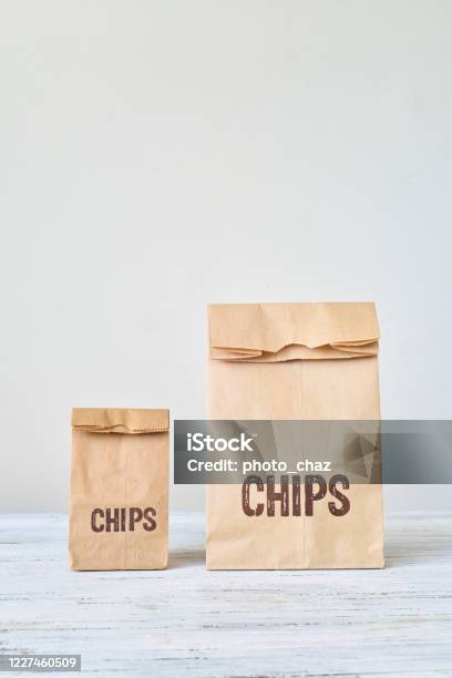 Small And Large Paper Bag Of Chips Stock Photo - Download Image Now - Bag,  Tortilla Chip, Small - iStock