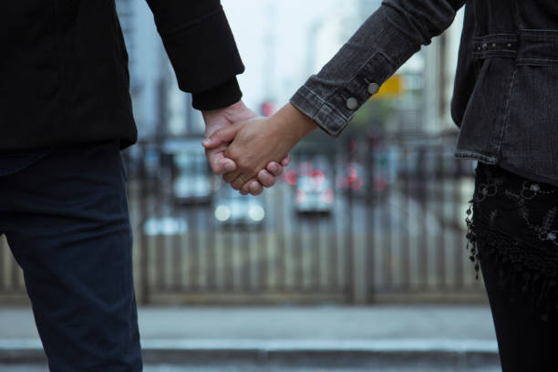 istock Romantic moment couple holding hands 1227468632