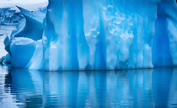 istock Floating Blue Iceberg Reflection Paradise Bay Skintorp Cove Antarctica 1227469477
