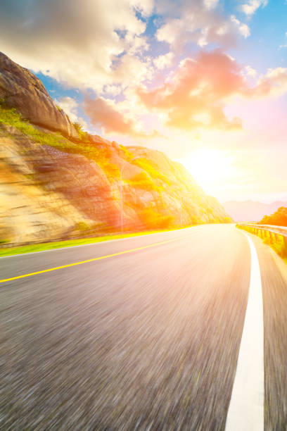 istock Motion blurred mountain road landscape. 1227471406