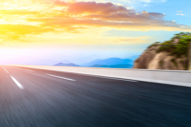 istock Motion blurred mountain road landscape. 1227471470