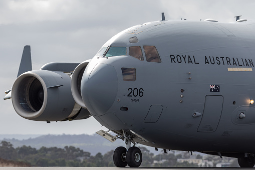 Avalon, Australia - February 28, 2013: Royal Australian Air Force (RAAF) Boeing C-17A Globemaster III military cargo aircraft A41-206 from 36 Squadron based at RAAF Amberley, Queensland taxiing at Avalon Airport.