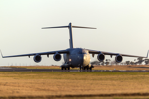 Avalon, Australia - March 1, 2013: Royal Australian Air Force (RAAF) Boeing C-17A Globemaster III military cargo aircraft A41-206 from 36 Squadron based at RAAF Amberley, Queensland on the runway at Avalon airport.