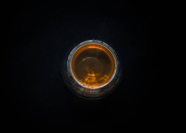 istock A cup of black tea in the black background 1227474291