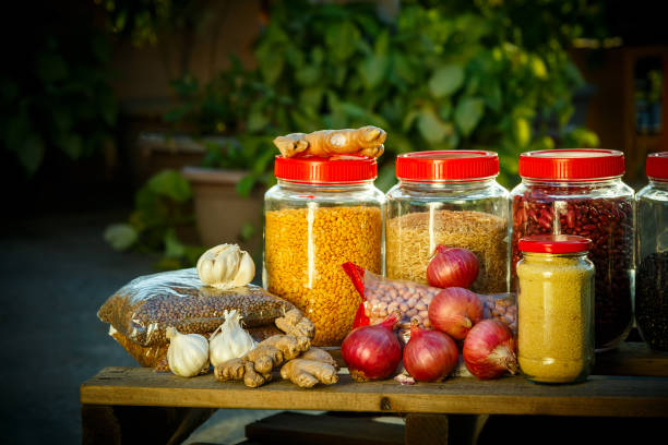 istock Donations food with rice, lentils, onions, ginger, peanuts on with green background 1227476389