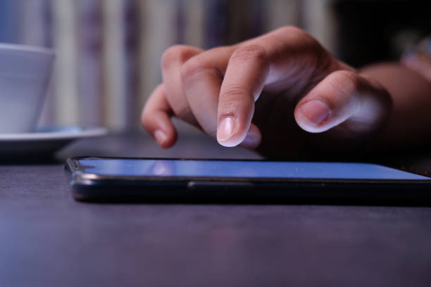 istock Close up of a women hand using smart phone 1227476611