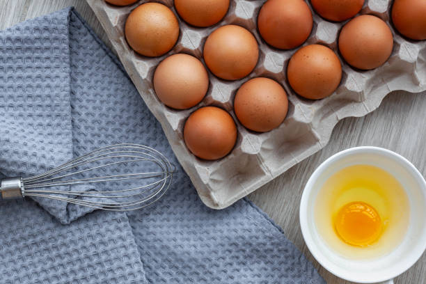 istock Whisk egg near the brown eggs 1227477479