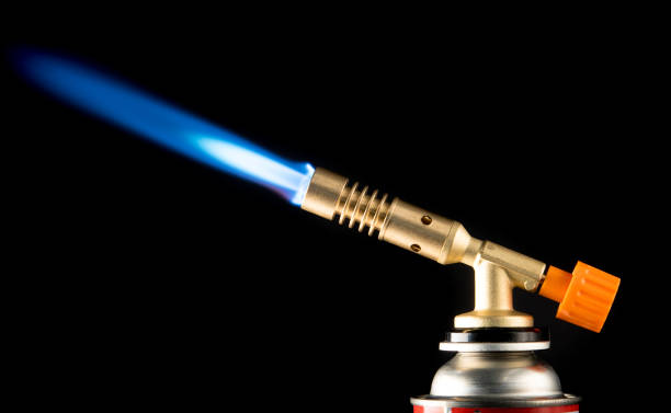 istock manual gas burner with blue flame 1227479827
