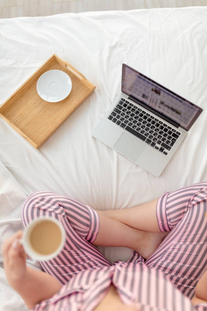 istock relaxed girl surfing the net while drinking tea 1227481173