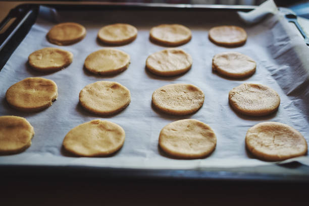 istock Round pieces of shortbread dough for making cookies or gingerbread 1227486084