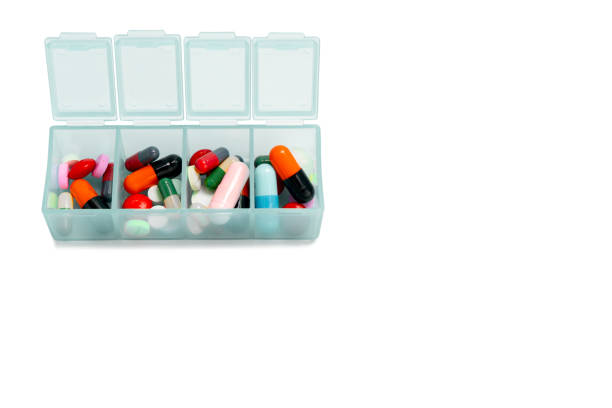 istock Pills in plastic box with copy space on isolated white 1227486163