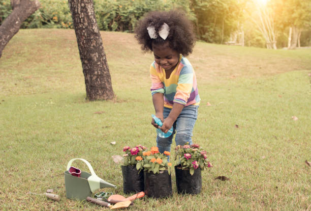 istock African girl is playing in the park 1227486256