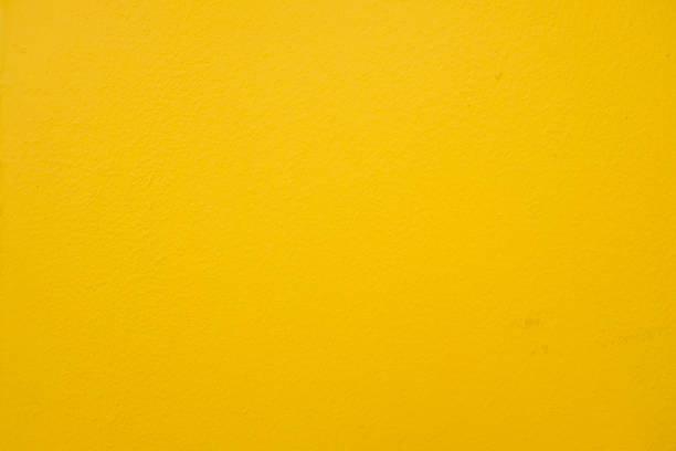 istock yellow cement or concrete wall texture for background 1227487427