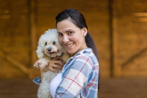 istock A young woman and her dog 1227487438