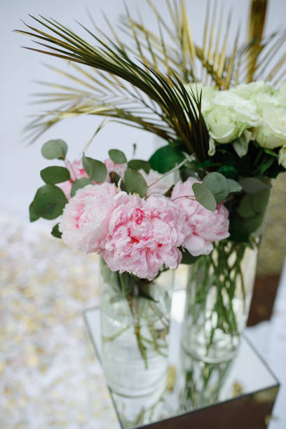 istock Pink peonies and roses in a wedding decor. 1227488130