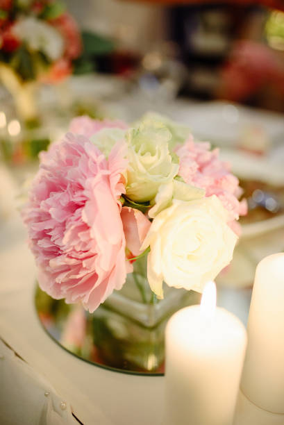 istock Pink peonies and roses in a wedding decor. 1227488284