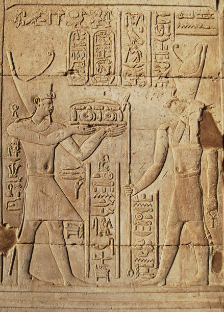 istock Ancient hieroglyph and relief in a Temple in Egypt 1227489494