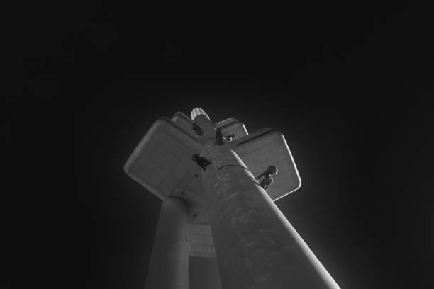 Zizkov Television Tower against the sky. View from below. Black and white image.