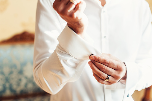 gang protection battery A Man Fastens Cufflink On The White Shirt Close Up Of A Man Hand Wearing A White  Shirt And Cufflinks Stock Photo - Download Image Now - iStock