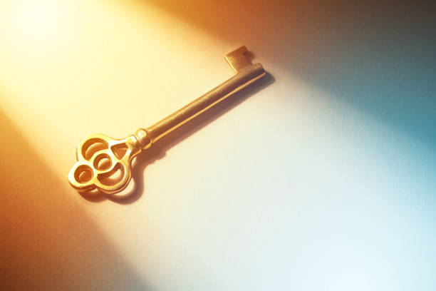 Golden Skeleton Key under Sunlight stock photo