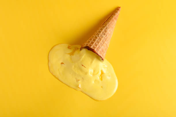 istock top view durian flaor ice cone melted on a yellow background 1227494719