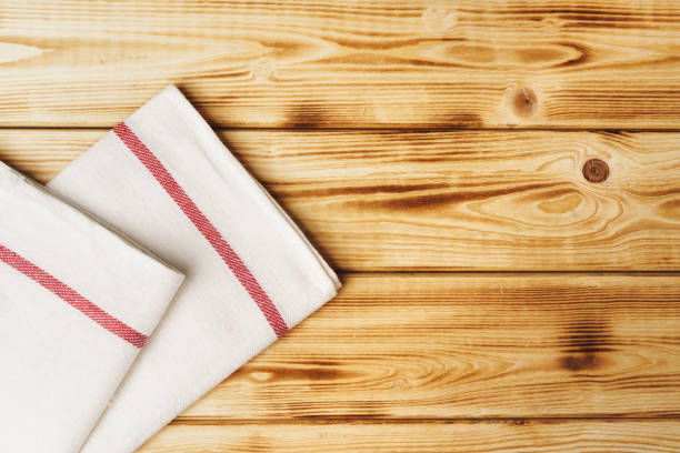 istock Kitchen towel or napkin over the wooden table. 1227498139