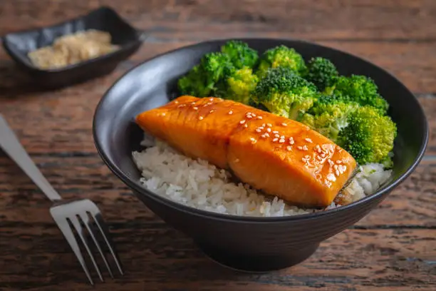 Photo of Salmon teriyaki with rice and vegetable in bowl