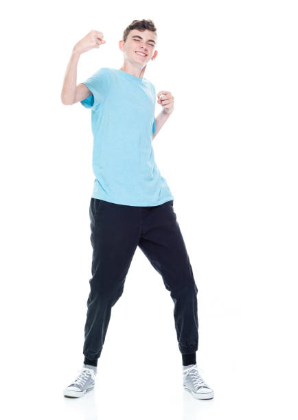 Caucasian male standing in front of white background