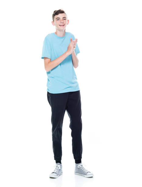 istock Caucasian boys standing in front of white background 1227502879