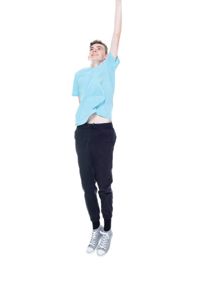 istock Caucasian boys flying in front of white background 1227503449